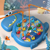 A blue magnetic fishing toy set with orange fishing rods and various colorful plastic fish and sea creatures.