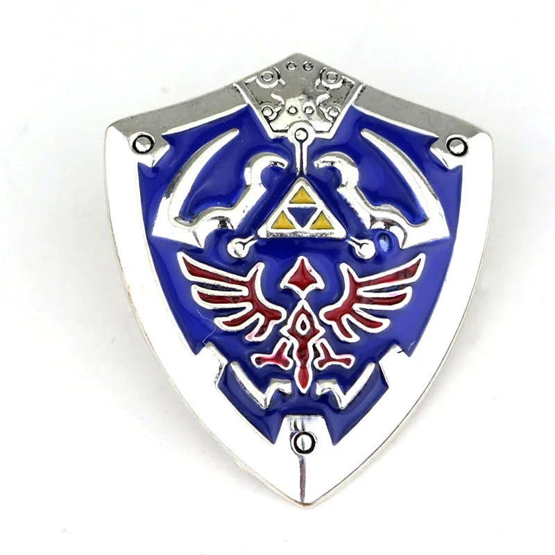 Silver enamel pin featuring a blue shield design with white and red details.