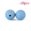 Two light blue silicone beads are shown against a white background.