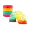 A colorful spring circle toy with rainbow stripes, demonstrating hand-eye coordination.