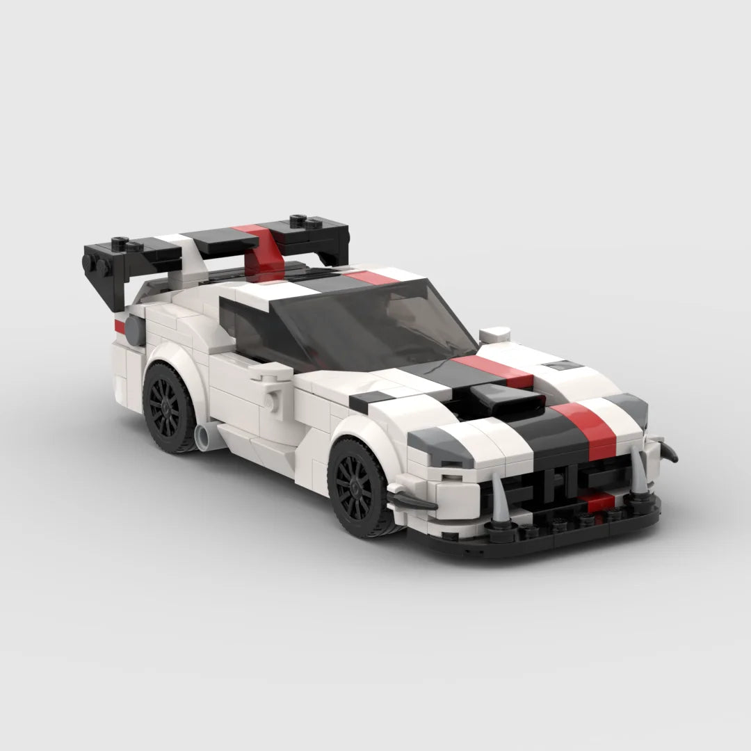 A detailed model of a classic supercar built from white, black, and red building blocks.