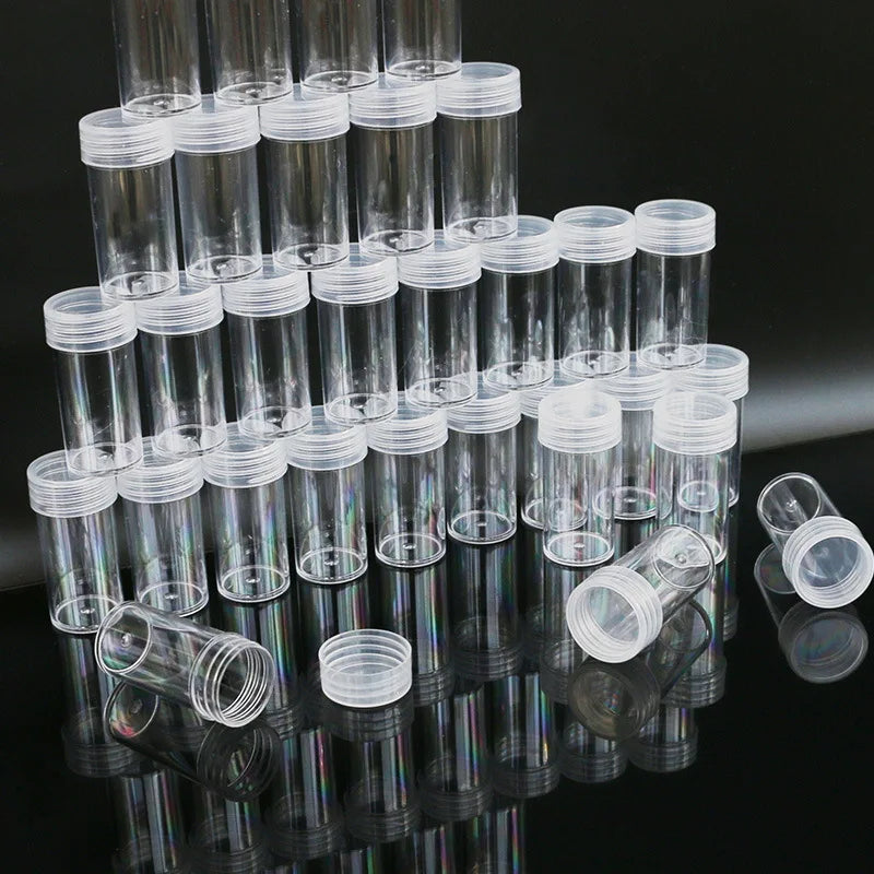 A collection of clear plastic storage bottles arranged in a pyramid formation.