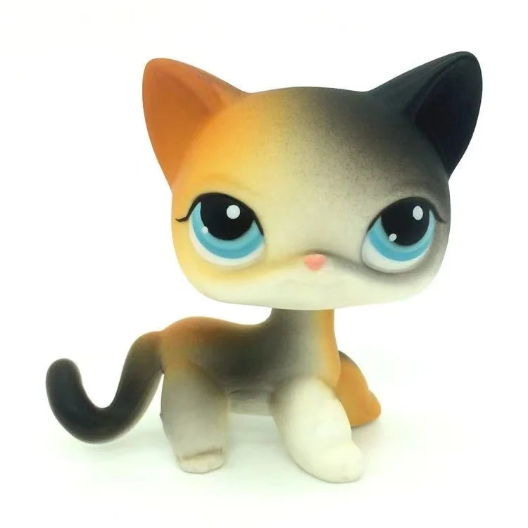 A small, stylized cat figure with orange and gray fur standing upright.