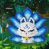 A white and blue Nine-Tailed Fox Minion figure made of building blocks set against a green forest background.