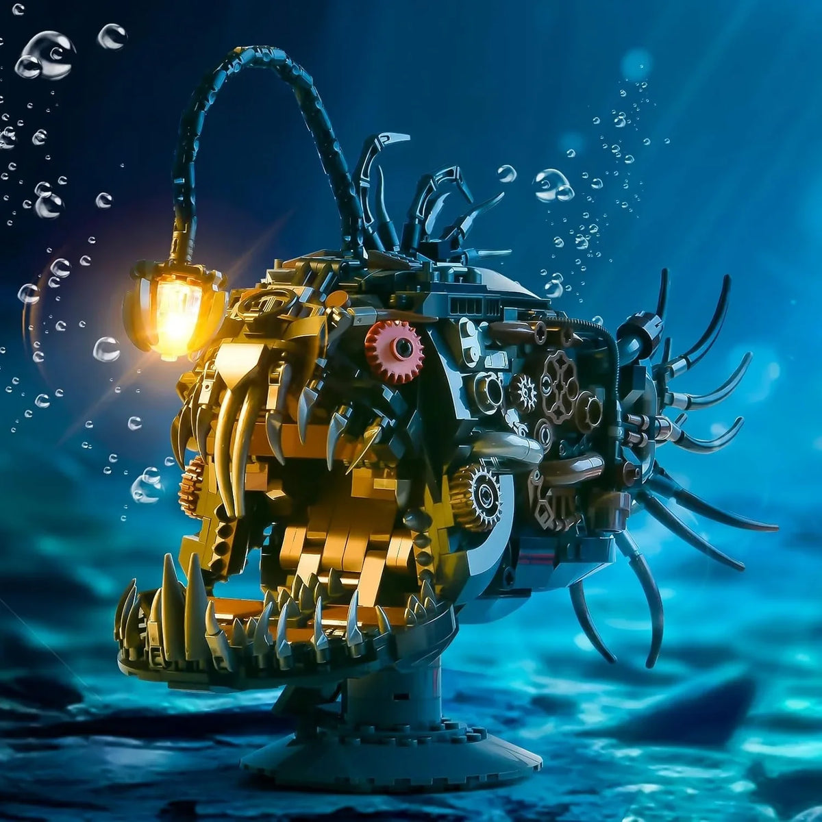 A detailed mechanical lantern fish model kit with gold and silver components floating in blue water.