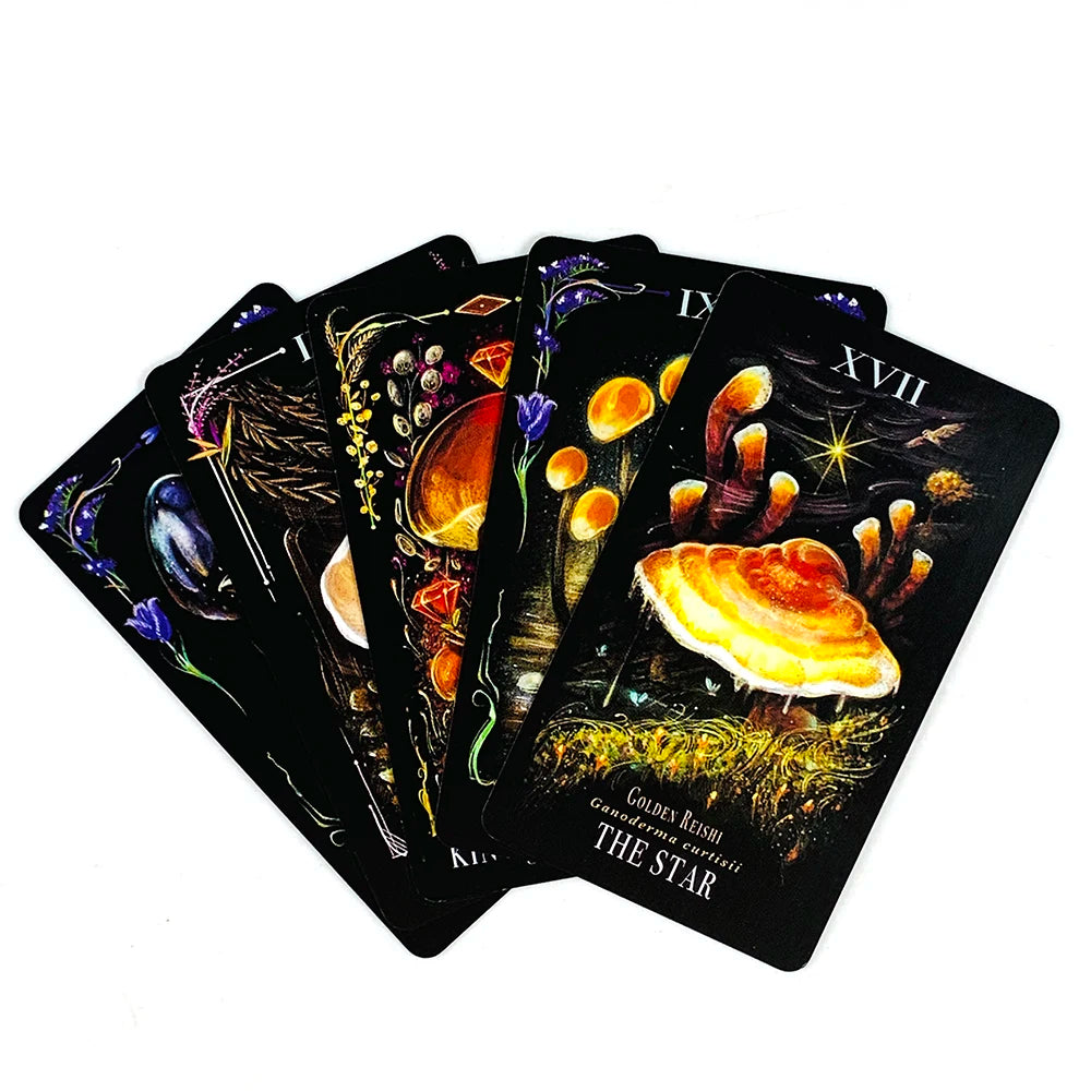 A stack of Midnight Magic Mushroom Tarot Deck cards featuring dark, mystical imagery and gold accents.