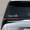 Close-up of a silver car's rear window showing the GUTS letter waterproof vinyl sticker on the taillight area.