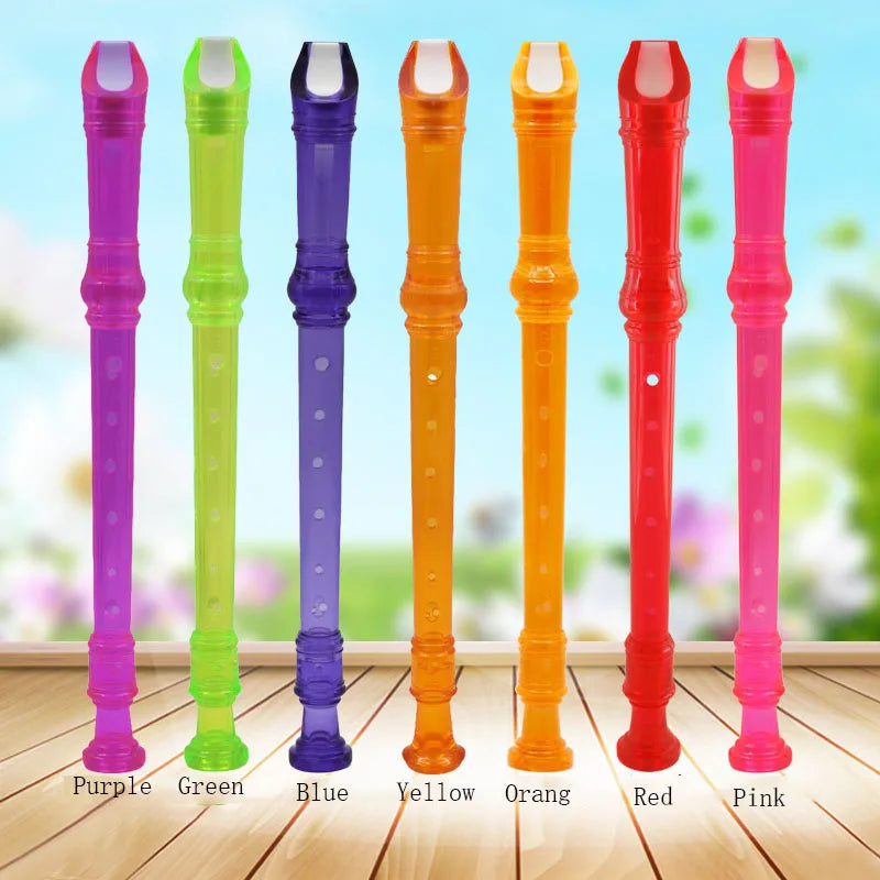 A set of eight colored transparent ABS recorder flutes: purple, green, blue, yellow, orange, red, and pink.