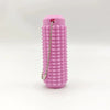 A pink spiky sensory keychain with a silver chain is shown against a white background.