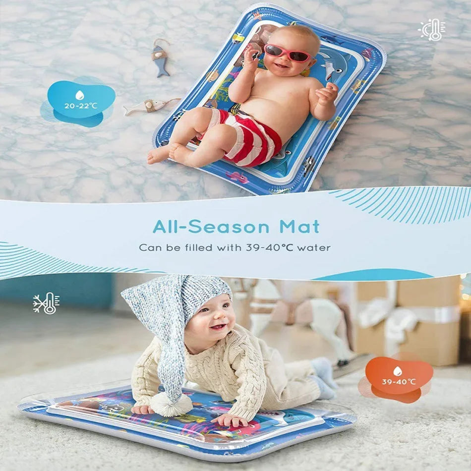 An inflatable baby water play mat is shown being used for tummy time by a smiling baby.