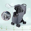 A gray universal waterproof winter stroller cover with a clear window and wheels is shown on a white surface.