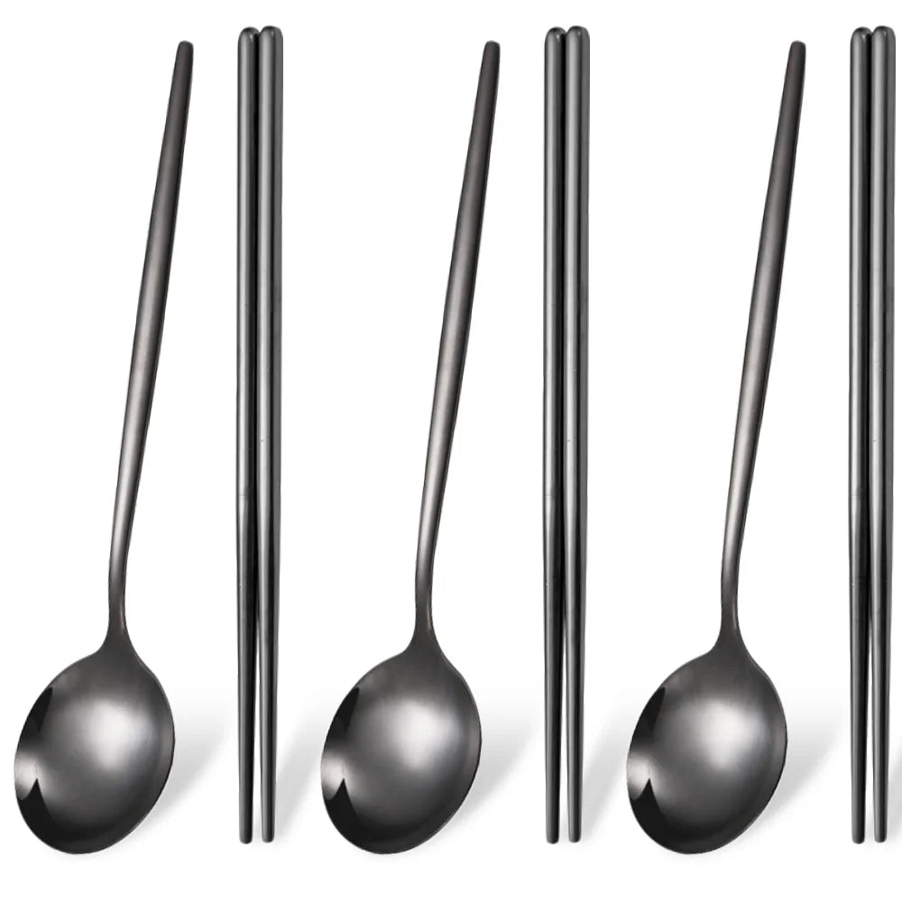 A set of six stainless steel Korean dinnerware pieces including spoons and chopsticks.