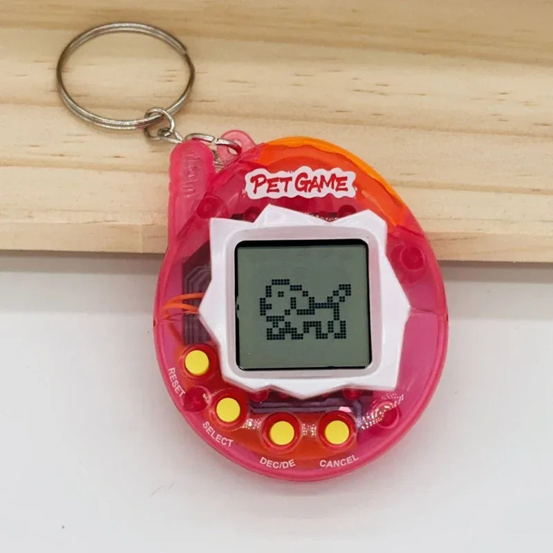 A pink electronic pet game toy with a digital screen and a metal keyring attached to a wooden surface.