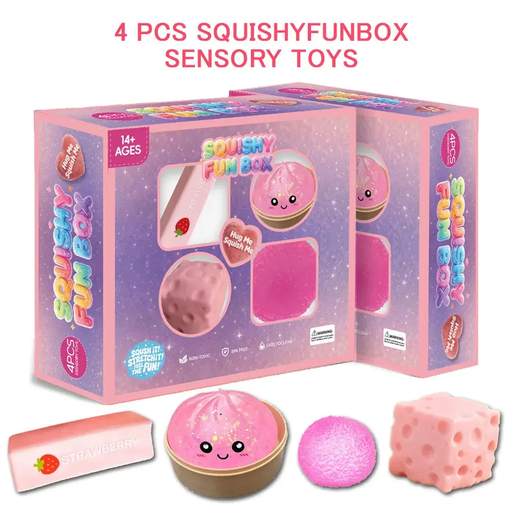 A box of 4 pcs Squishy Fun Box sensory toys including strawberry shaped squishies and pink foam toys.