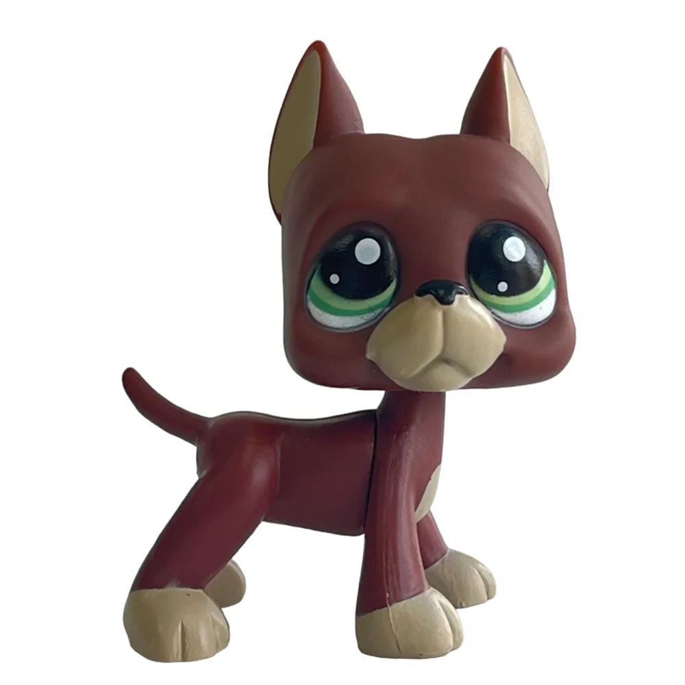 Sammler-Katzenfigur mit braunem Fell und großen grünen Augen