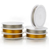 Rolls of stainless steel beading wire for jewelry making displayed on a white surface.