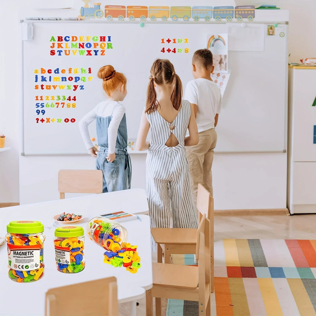 A set of magnetic letters and numbers for kids displayed on a table with wooden chairs in a bright room.