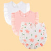 A set of three pure cotton muslin baby bibs in white, pink, and white with floral embroidery.