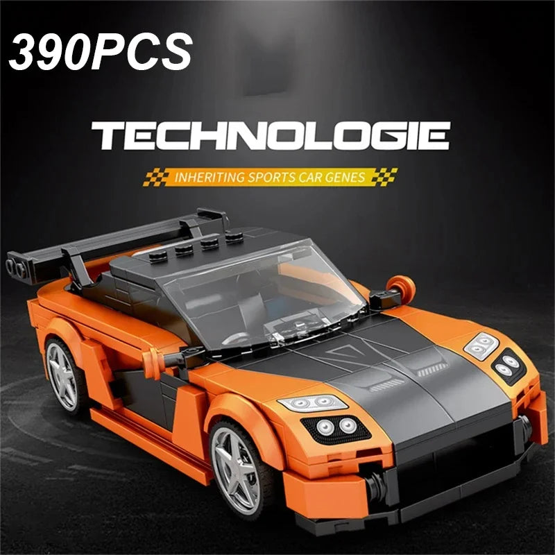 An orange and black sports car model built from building blocks, displayed on a dark surface.