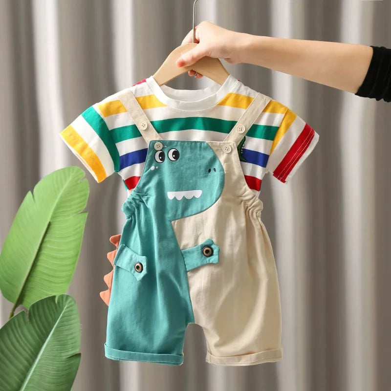 A child's two-piece outfit set featuring a dinosaur-themed top and overalls with striped sleeves.