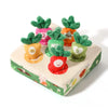 A box of soft pulling carrot sensory toys featuring five colorful carrots with green tops for babies.