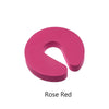 Tapón de puerta de espuma rosa sólido con forma curva, color rojo rosa.