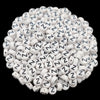 A pile of small white acrylic alphabet letter beads, including the letter N, for jewelry making.