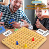 A close-up of an 8x8 puzzle board game with yellow tiles and various colored pieces being used for multiplication learning.
