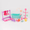 A pink pet spa bath and drying rack playset featuring a basin, a faucet, and various pink and yellow accessories.