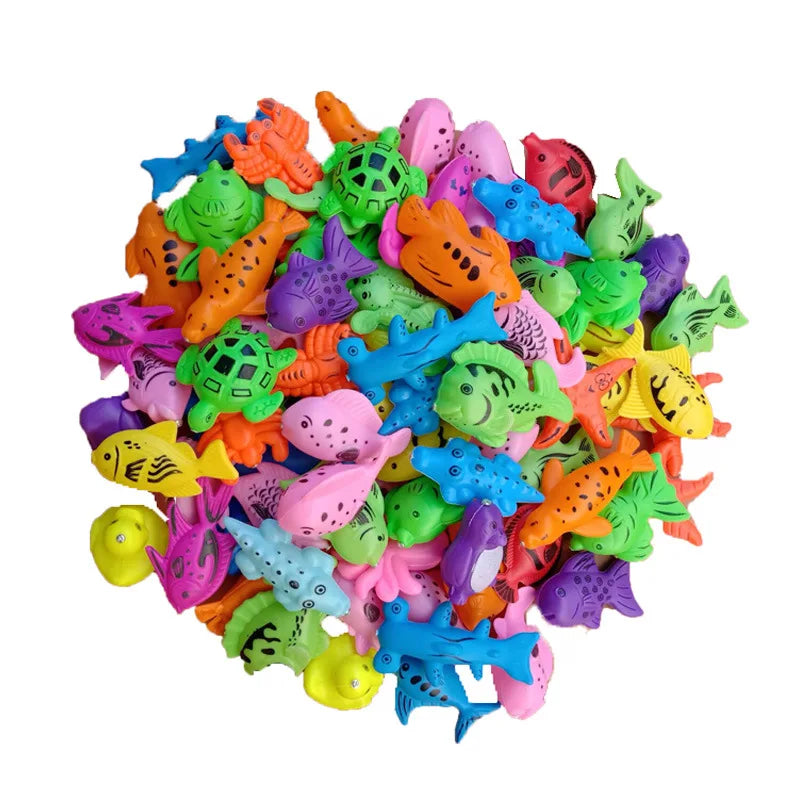 A pile of colorful magnetic fishing game toys for kids featuring various fish and sea creatures.