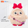 A fluffy pink plush robot with large eyes and a pink strap is shown against a white background.