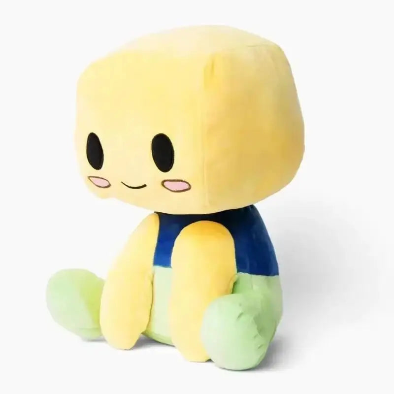 A yellow, round cartoon plush toy with a simple face and blue accents.