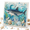 Diamond art kit featuring a silver shark and various sea creatures like starfish and shells on a white background