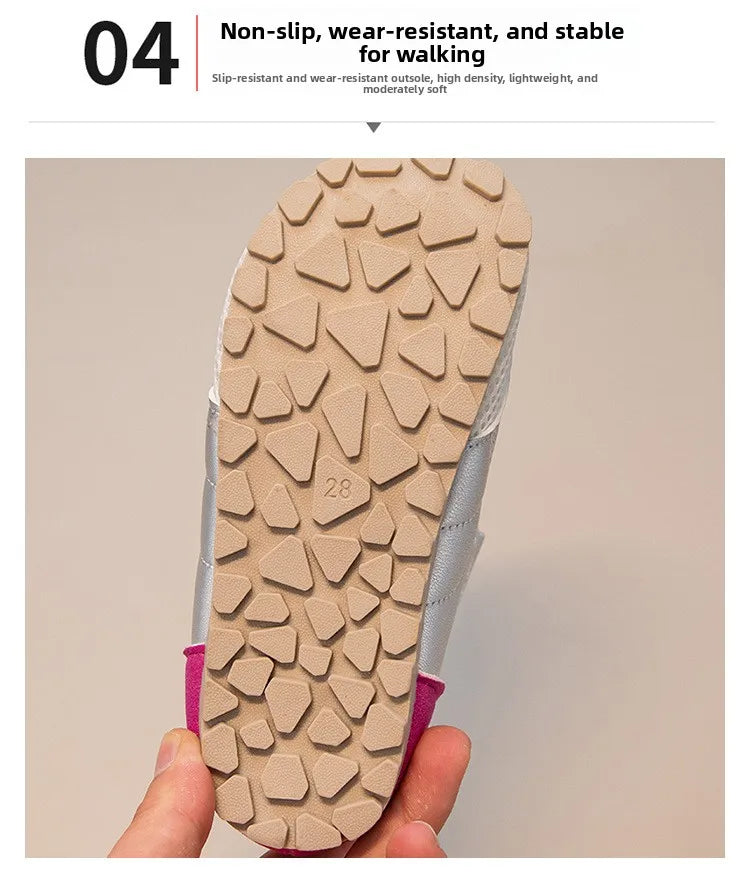 Close-up view of the sole of a light beige slip-on shoe with textured, non-slip tread