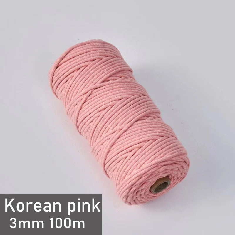 A roll of Korean pink 3mm cotton macrame cord measuring 100 meters.