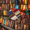 A close-up display of various self-adhesive PU leather repair patches in a wide array of colors and shades.