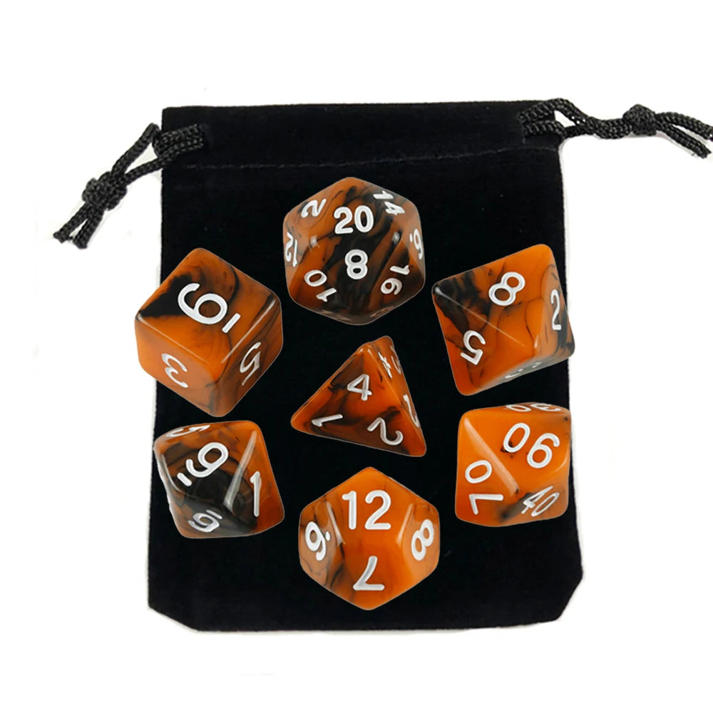 A set of polyhedral dice, including a d10 and d20, stored in a black fabric bag.