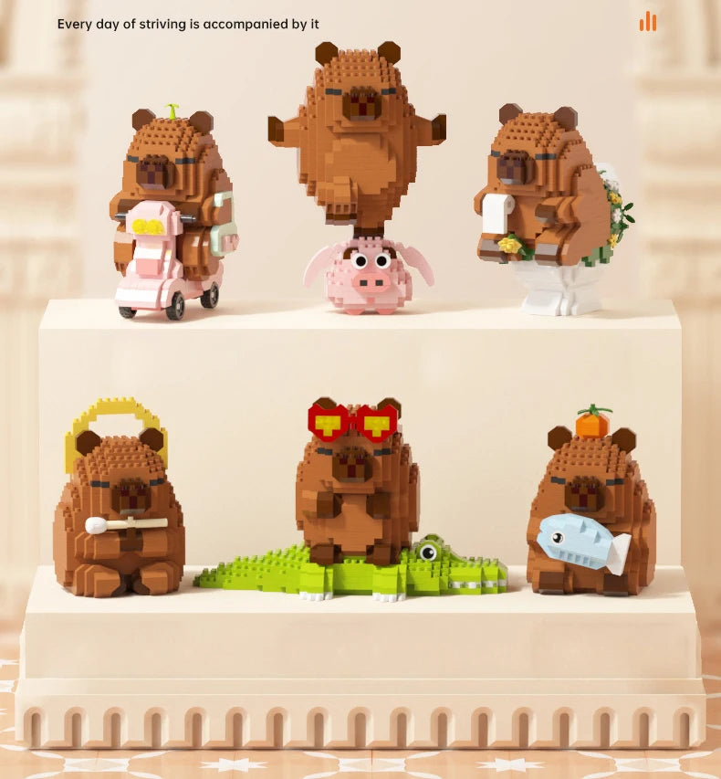 A collection of cute animal models made from brown and pink LEGO-style building blocks displayed on a white shelf.