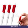 Three red pens are shown, with one pen being held by a hand.