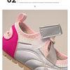Pink and gray casual slip-on shoes showing the velcro design feature on the upper