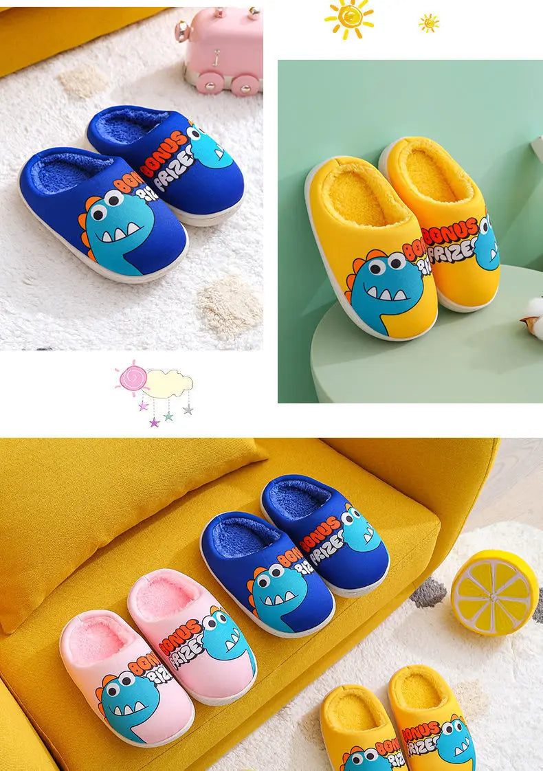 A collection of pink, blue, and yellow cartoon dinosaur plush slippers displayed on a yellow fabric.