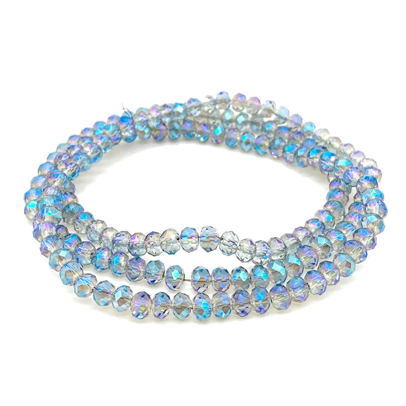 A strand of clear and blue iridescent Austrian faceted crystal beads for jewelry making