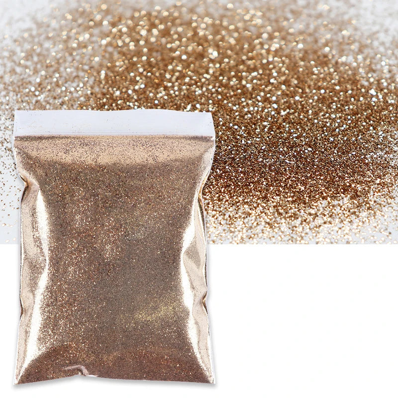 A bag of holographic fine glitter powder scattered across a surface.