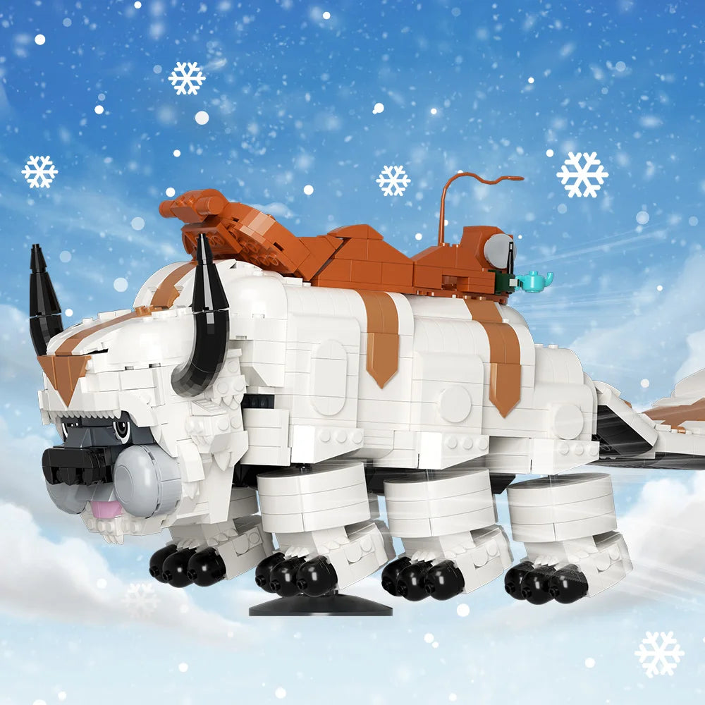 A white and orange flying bison model built from LEGO bricks against a snowy blue background.