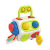 A white and green Montessori pop-up animal toy with yellow eyes and colorful parts.