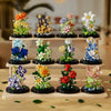 A collection of buildable eternal rose flower kits featuring various colored and styled flowers on black bases.