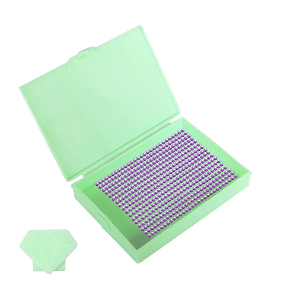 A lime green diamond painting storage organizer box with a purple bead tray inside.