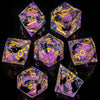 A set of translucent purple resin dice shaped like pyramids and cubes, used for RPG gaming.
