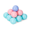 A collection of colorful plastic balls in shades of pink, blue, and purple arranged in a pyramid.