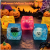 A set of translucent ice cube squishy toys shaped like ghosts and other Halloween figures on a dark surface.
